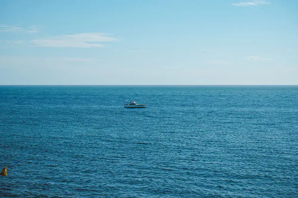 Wide open ocean waters during a daytime boat trip